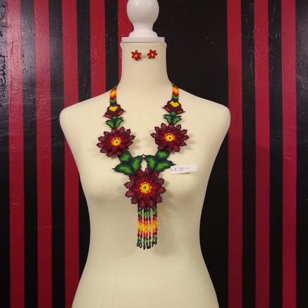This is a beaded necklace with earrings